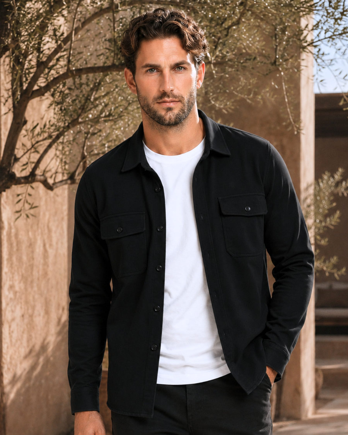 Grant Oak black overshirt worn over a white T-shirt, outdoor front view #Color_black