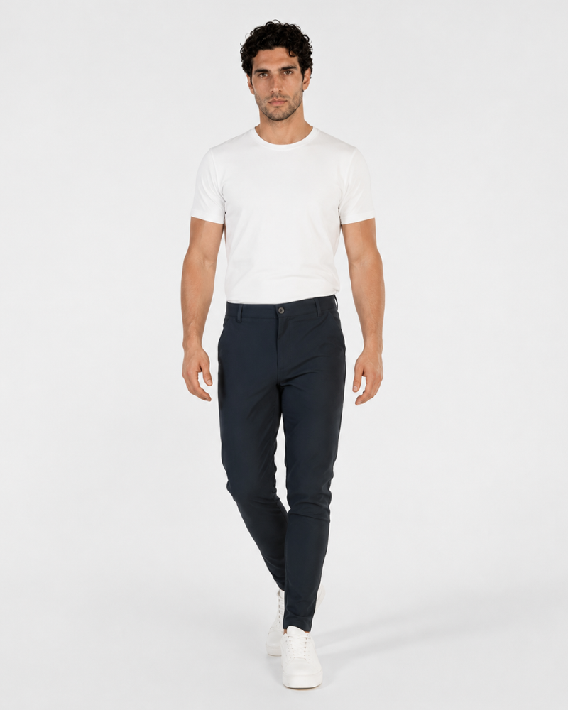 Grant Oak navy lightweight stretch chinos in a slim tailored fit, walking view #color_navy