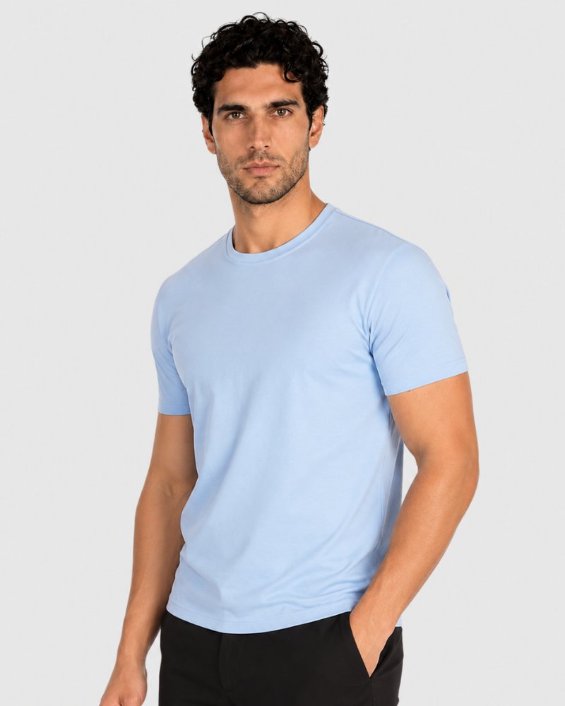 Grant Oak light blue crew neck t-shirt on male model, 3/4 angle, gray background #Color_light blue