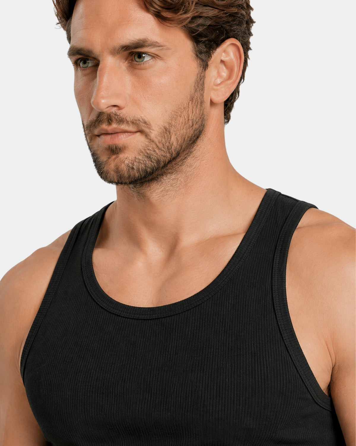 Grant Oak black ribbed tank top on male model, close-up detail of neckline and shoulder, light gray background #Color_black