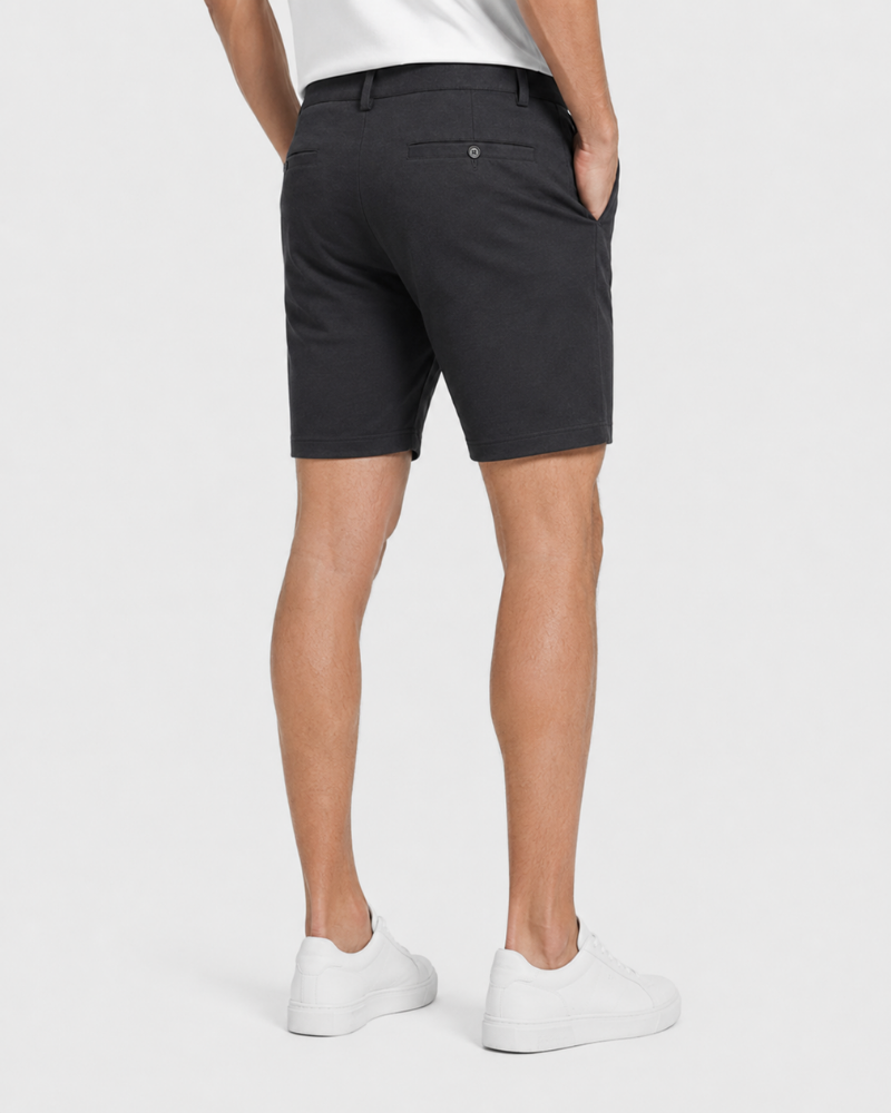 Grant Oak gray shorts on male model back view full body light gray background #color_gray