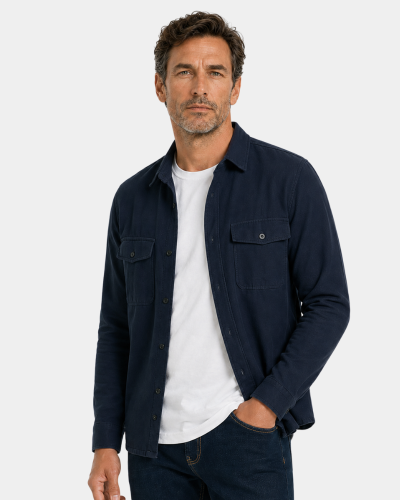 Man wearing a Grant Oak navy shirt over a white t-shirt on a light gray background #color_navy