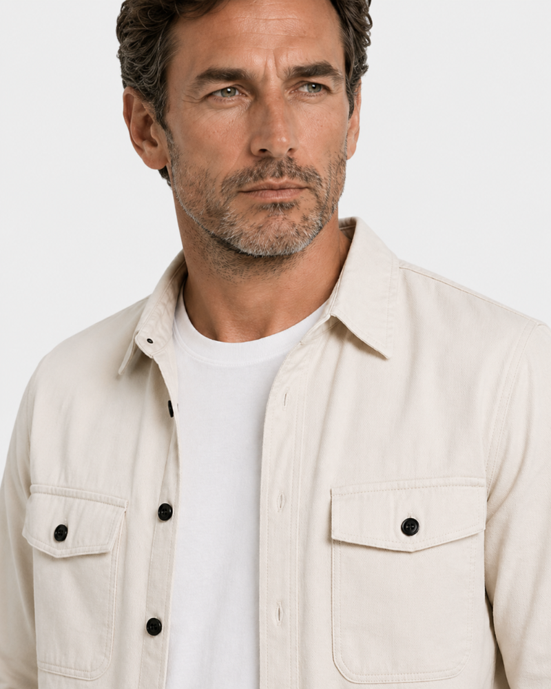 Grant Oak stone overshirt, close-up of buttons and fabric worn over a white T-shirt #color_stone