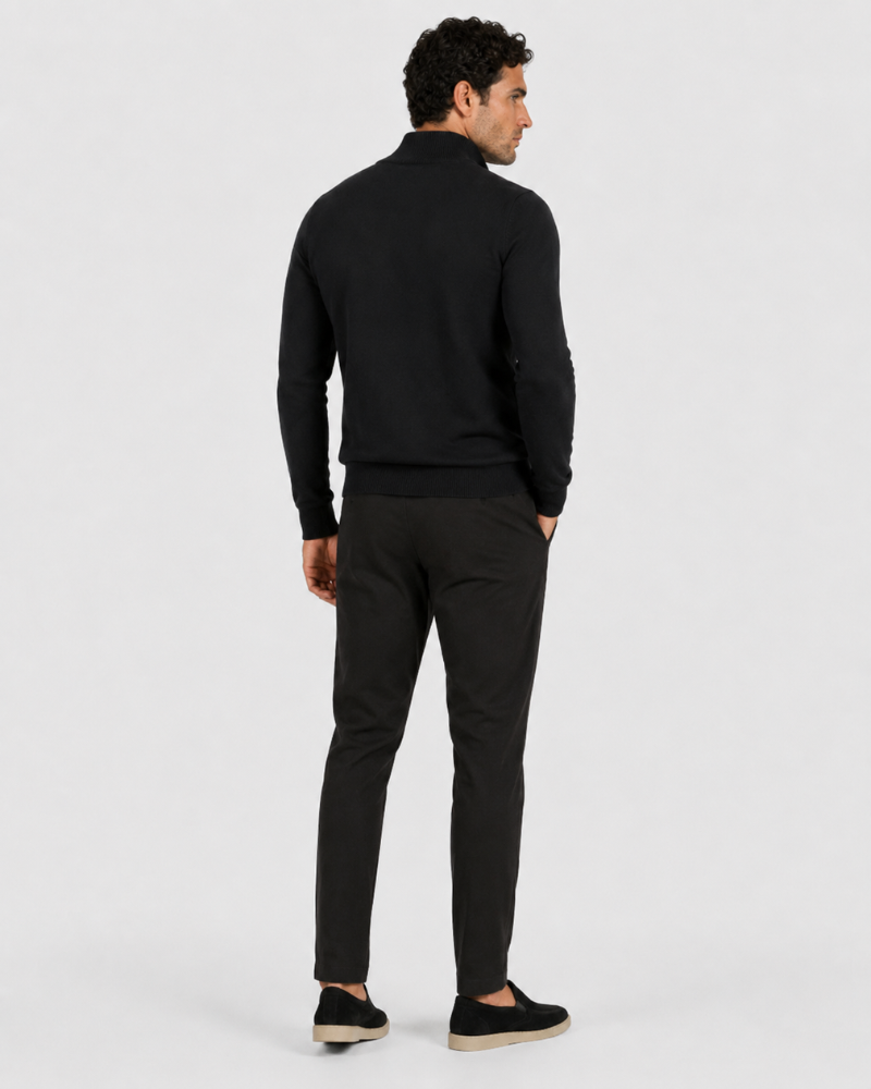 Grant Oak black half-zip knit sweater on male model, back view, full body, light gray background. #Color_black