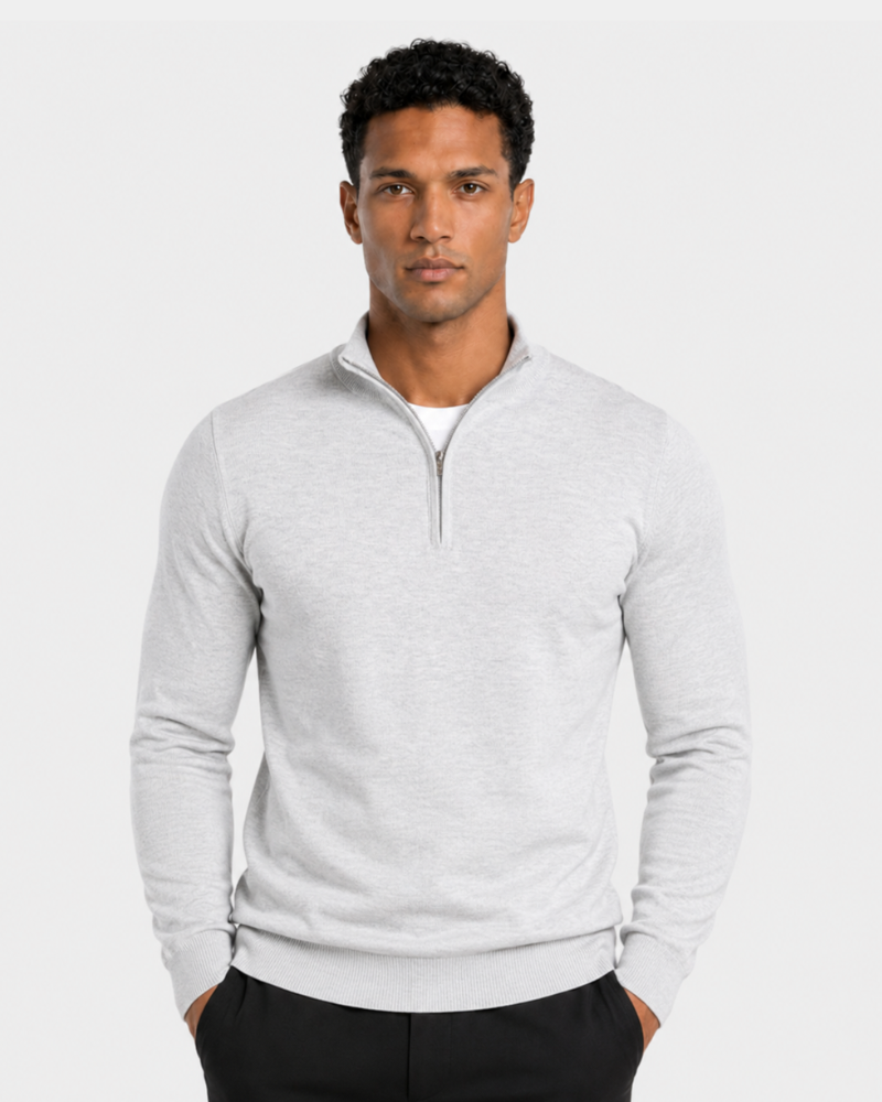 Grant Oak light gray marl half-zip knit sweater on male model, front view, upper body, light gray background. #color_gray