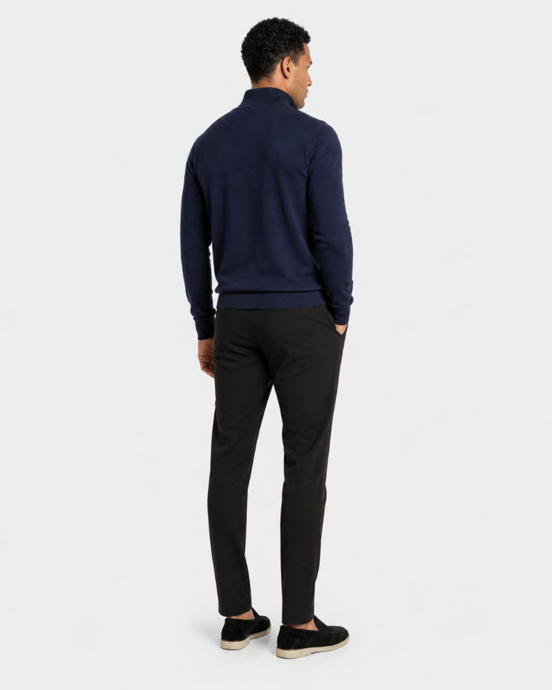 Grant Oak navy Knit Half-Zip Sweater styled with black trousers, full-body side view, white background #color_navy