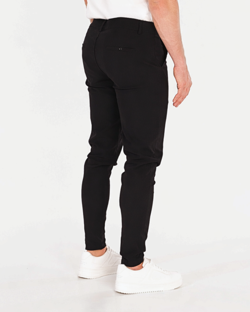 Grant Oak black lightweight stretch chinos with rear welt pockets, back view #color_black