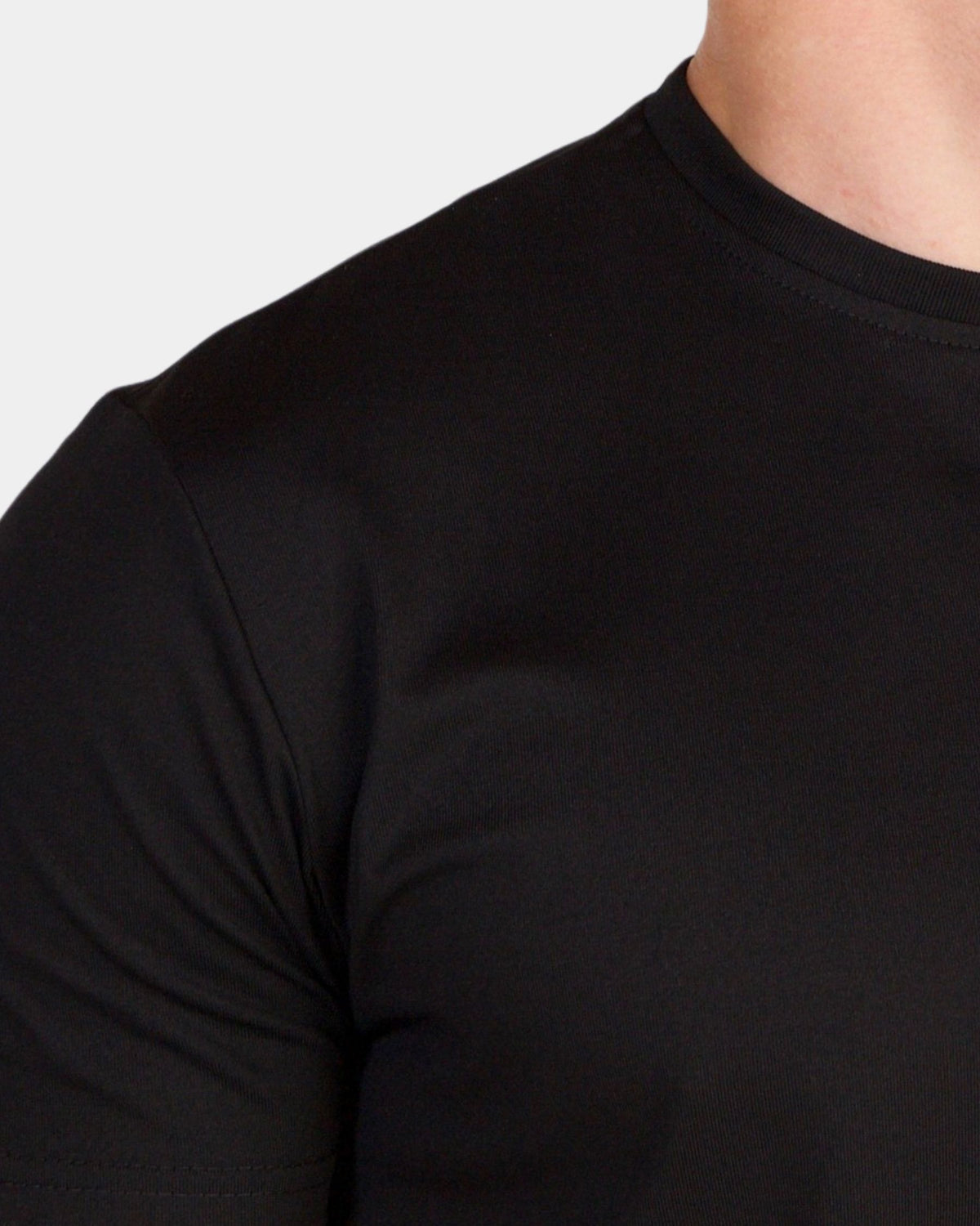 Grant Oak Smart Fit T-Shirt 3-Pack All Black — close-up of the plain black crew-neck t-shirt, light gray background.