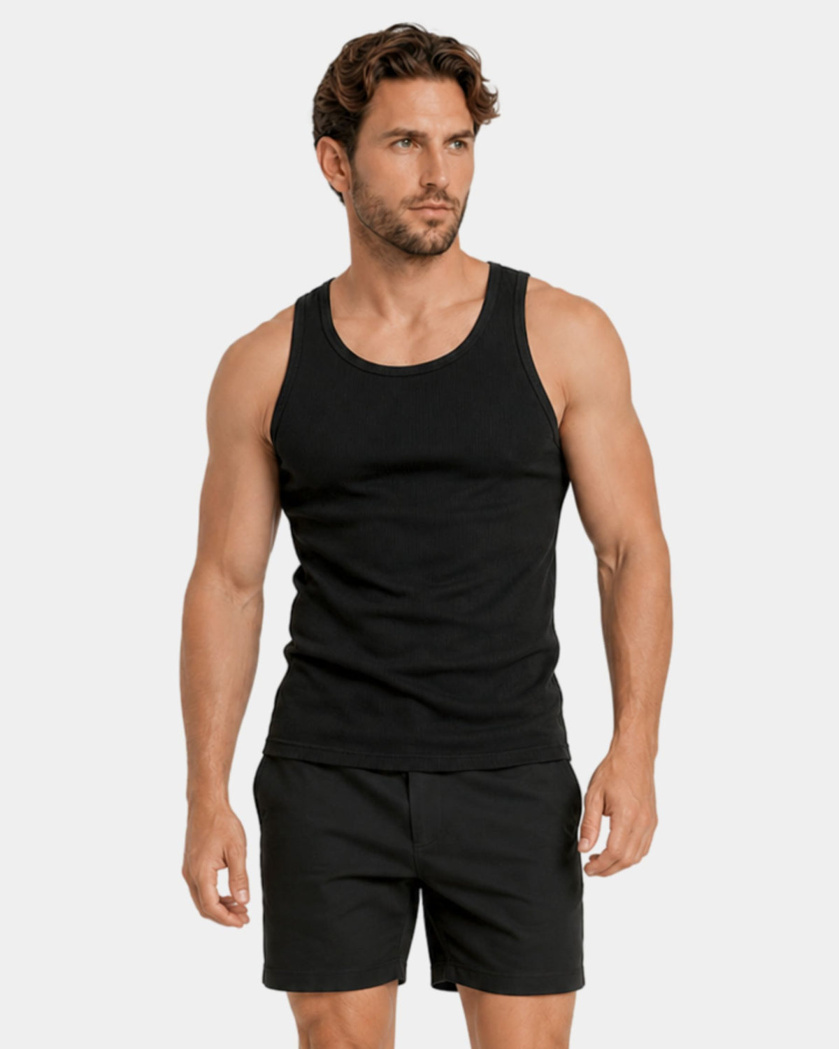 Grant Oak Smart Fit Tank 3-Pack All Black — man wearing the black tank top and shorts on a white background.