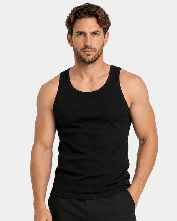 Grant Oak black ribbed tank top on male model, front view upper body, light gray background #Color_black